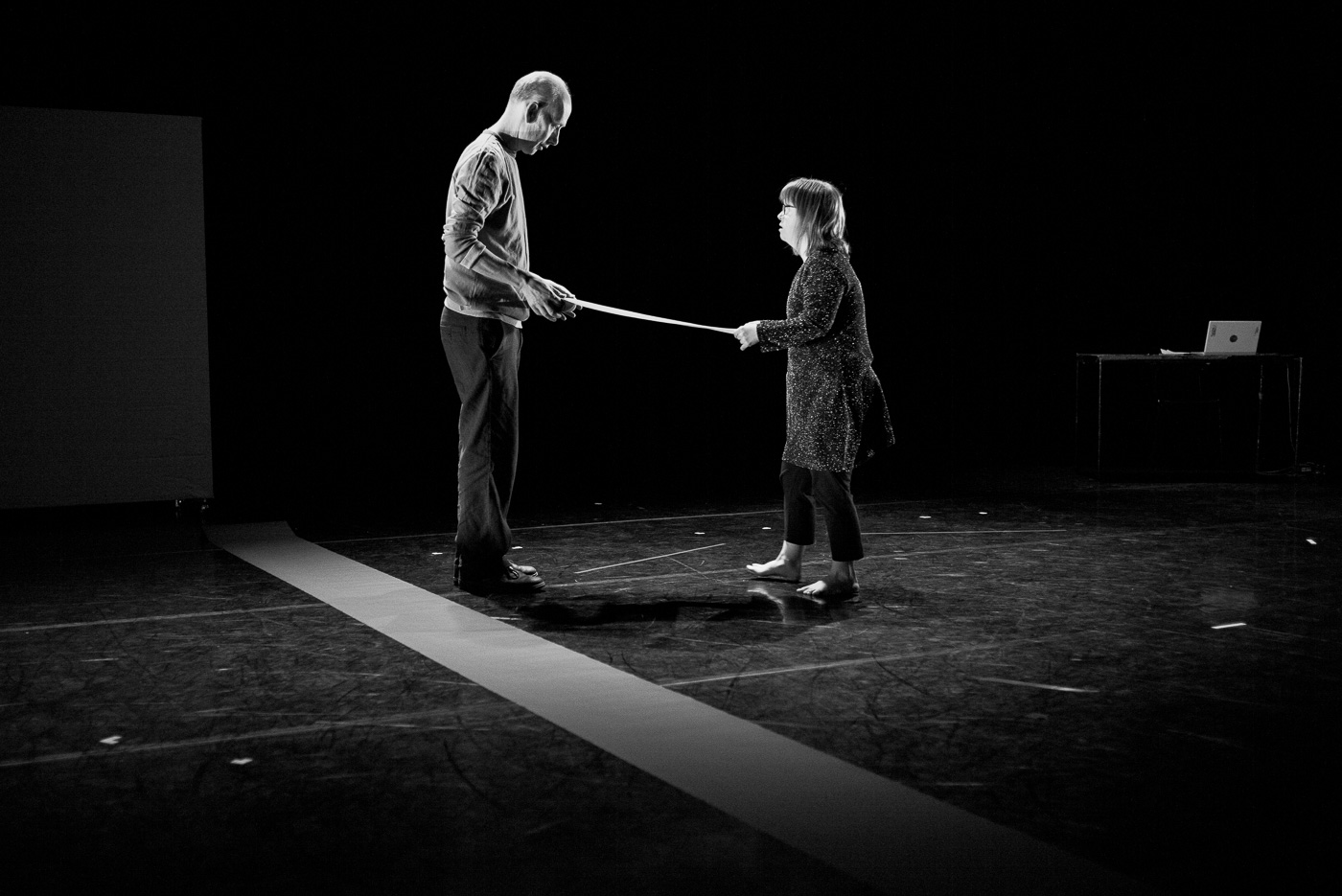 Black and white photo of Daniel dancing with Bethan Kendrick at The Place theatre